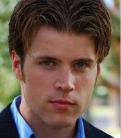 Justin Landry Serious-looking young man with dark hair